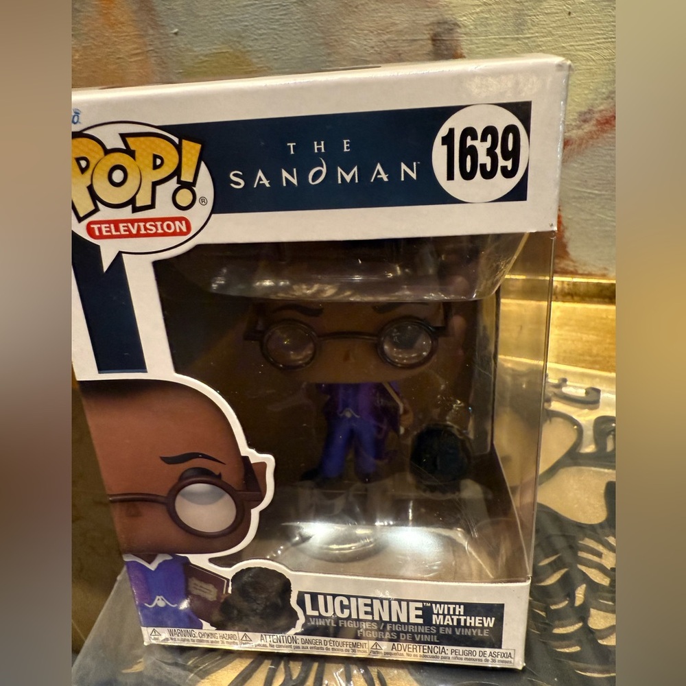 Lucienne with Matthew Funko Pop “The Sandman” 1639